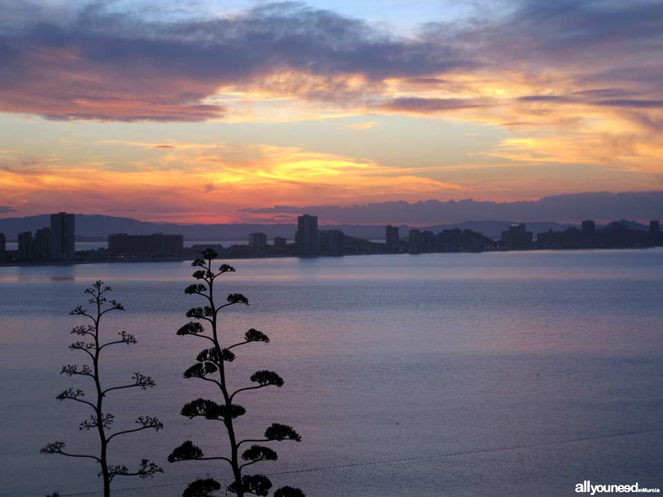 Sunset in La Manga del Mar Menor. Cabo de Palos Lighthouse